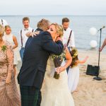 Bride and father walking down the aisle at a Long Island beach wedding